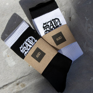 Black and white Socks and with kraft packaging
